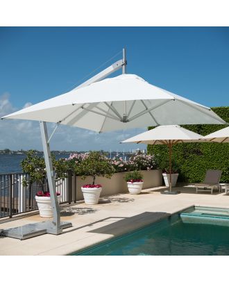 white heavy duty cantilever parasol on pool side