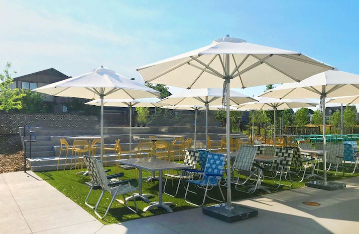 used commercial parasols on restaurant terrace 